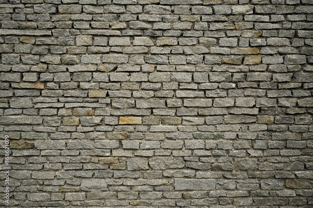 Large grey brick wall in the city Large grey brick wall in the city