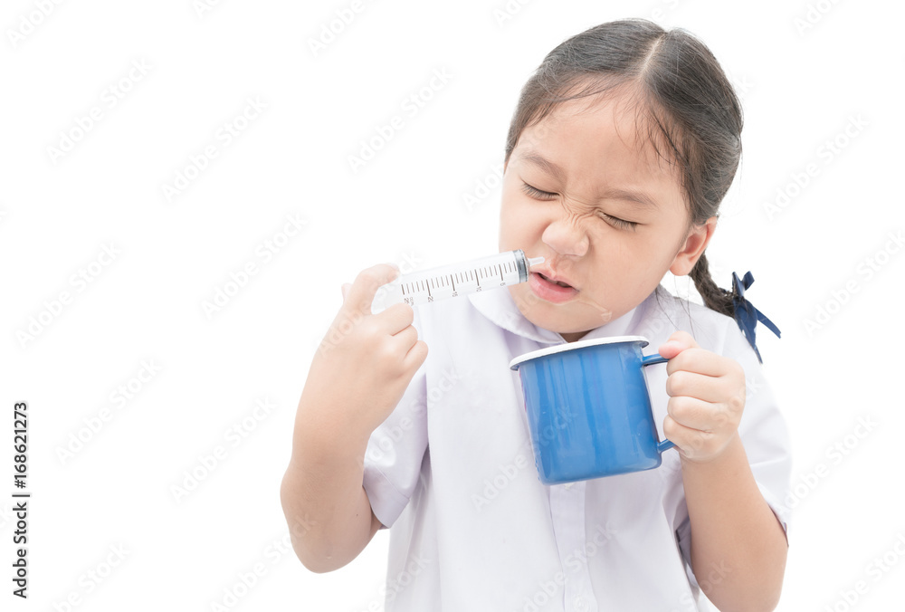 asian student girl flushing her nose with syringe and saline asian student girl flushing her nose with syringe and saline