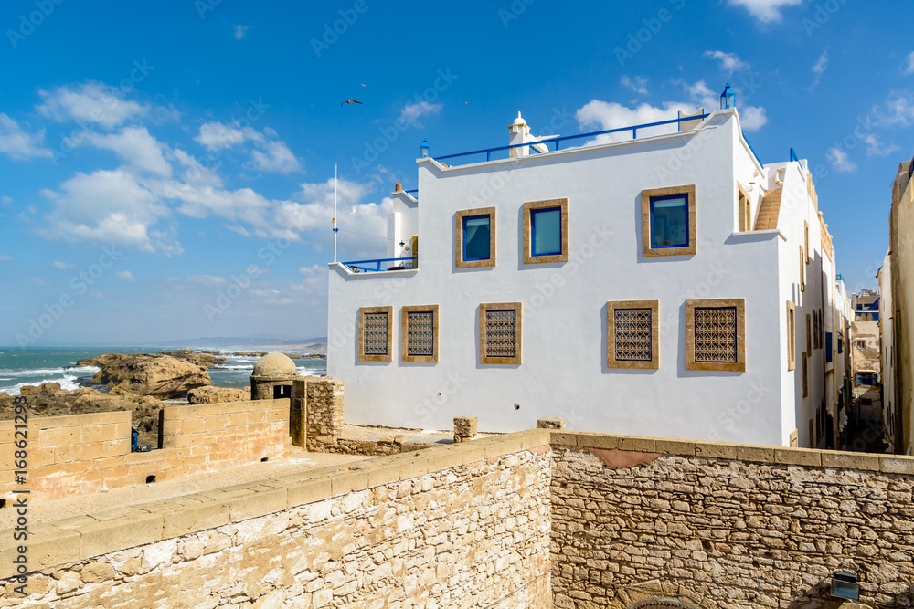 A typical white Moroccan house built on the fortress in Essaouira, Morocco A typical white Moroccan house built on the fortress in Essaouira, Morocco