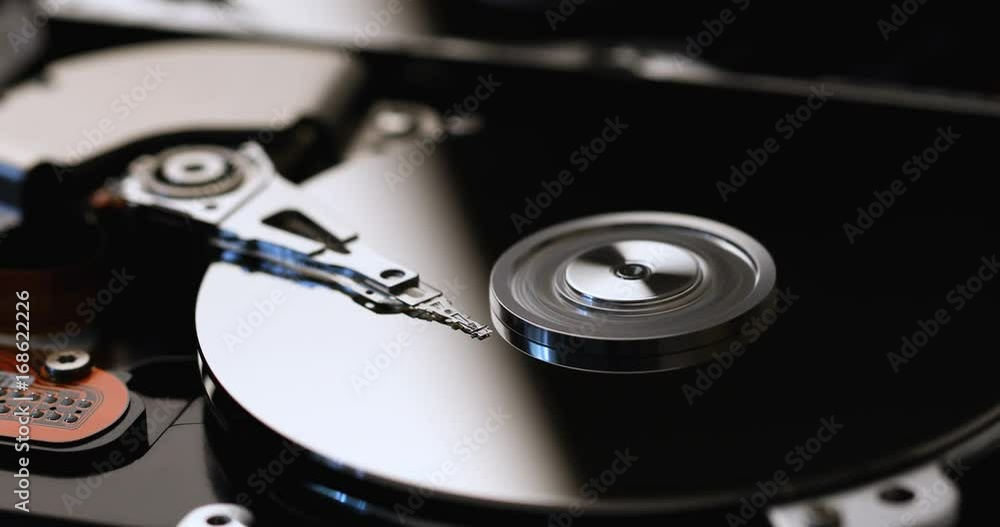 closeup of computer hard drive spinning closeup of computer hard drive spinning