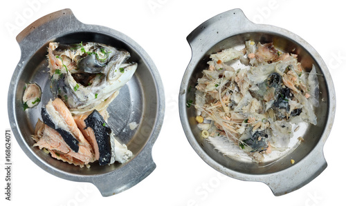 Boiled salmon head from fish soup on a metal plate photo