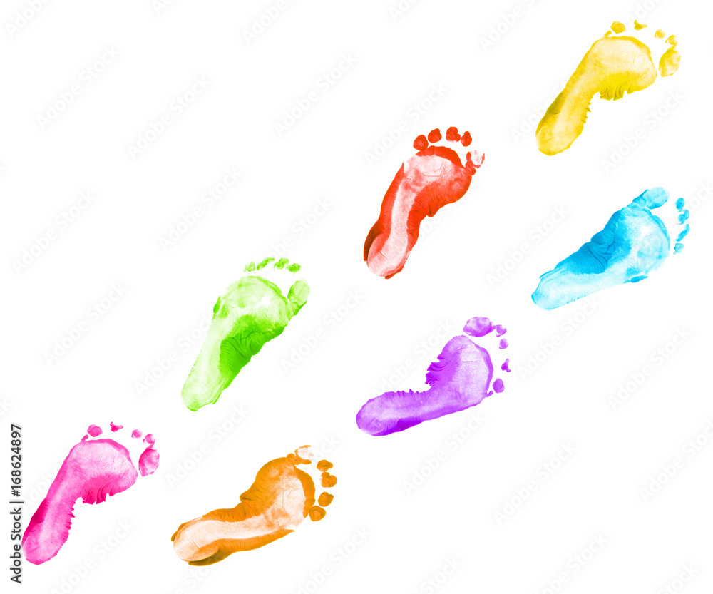 Fototapeta premium Rainbow foot prints kid colorful set isolated on white background. Many fingerprint or stamp texture artwork of kids for education and journey. Bottom view. Close up.