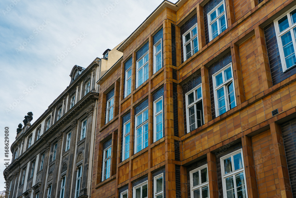 Fototapeta premium orange and brown facaded buildings in a row