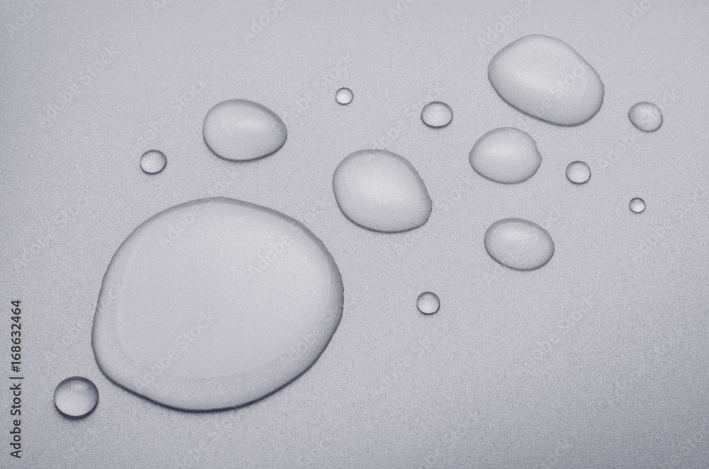 water drops with reflection on pixel textured background, black & white photography water drops with reflection on pixel textured background, black & white photography
