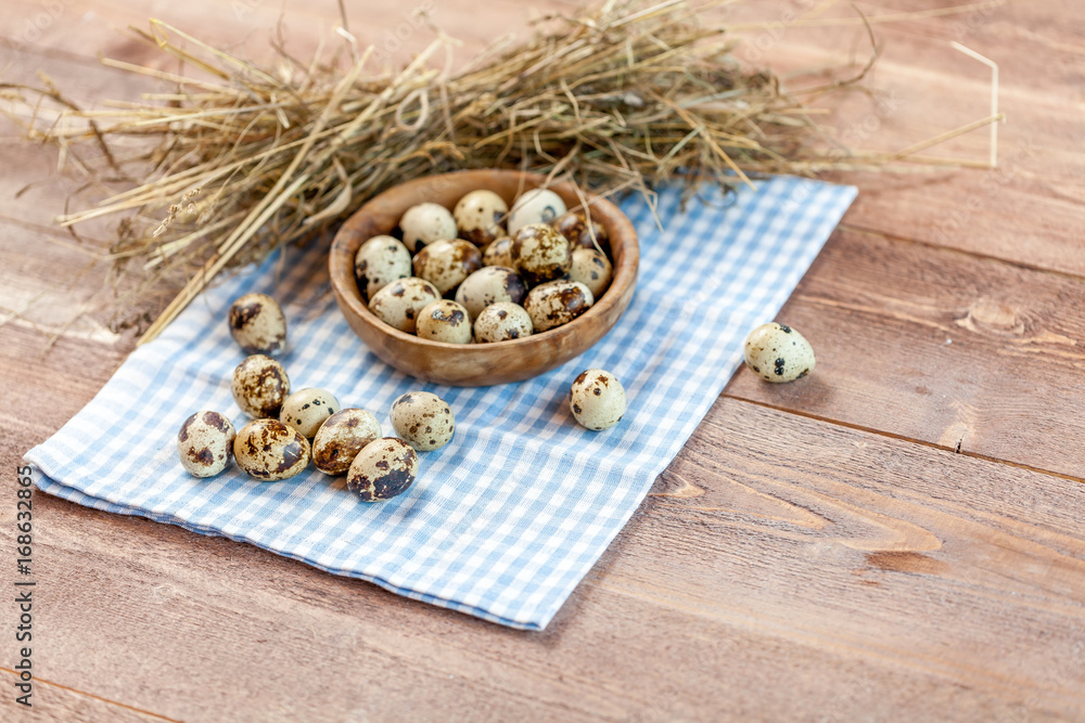 Quail eggs on the old rustic wooden table. Quail eggs on the old rustic wooden table.