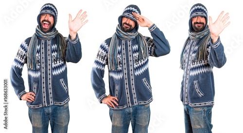 Set of Man with winter clothes saluting