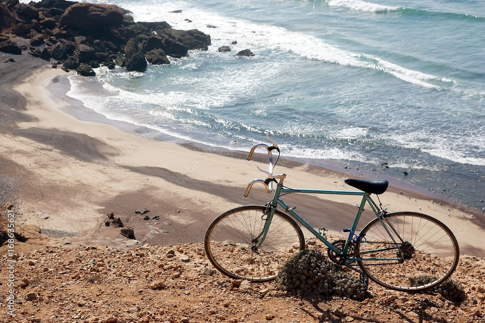 Fototapeta premium Bicycle on the Atlantic Ocean coast