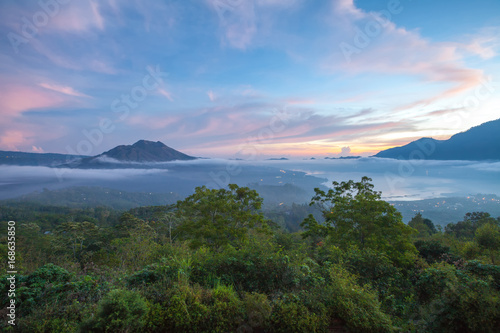 Kintamani volcano and Lake Batur in the morning, viewed from Penelokan are a popular sightseeing destination in Bali's central highlands, Indonesia.