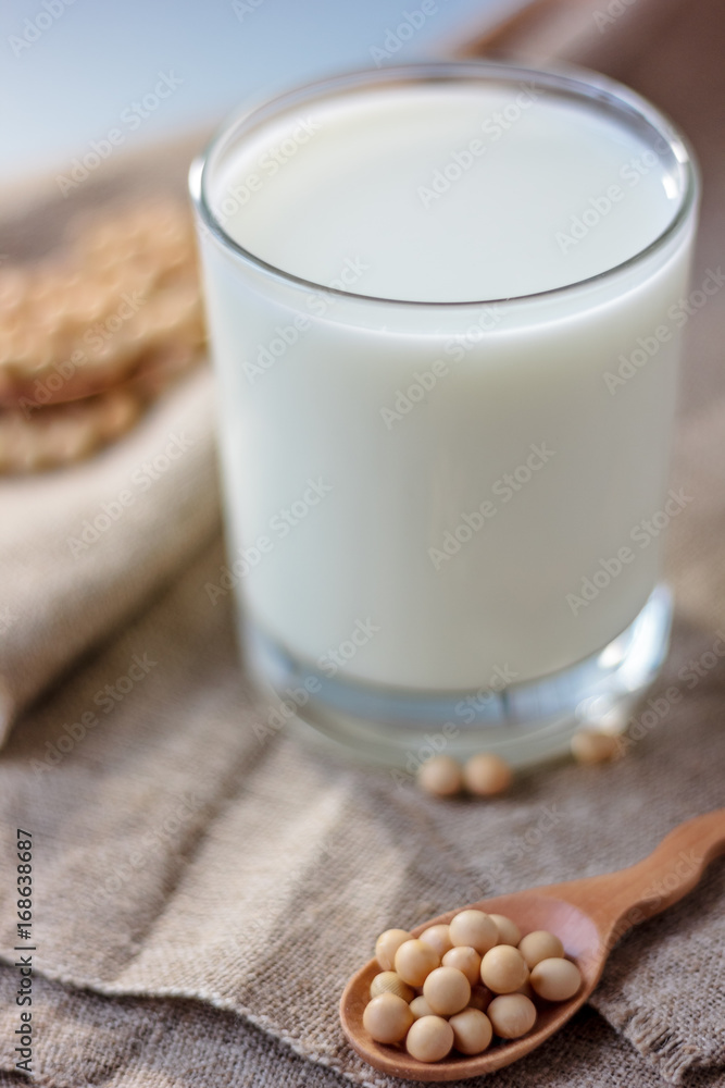 Soy milk with soy beans around it. Soy milk with soy beans around it.