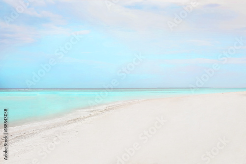 Young woman on beach in summer day © Africa Studio