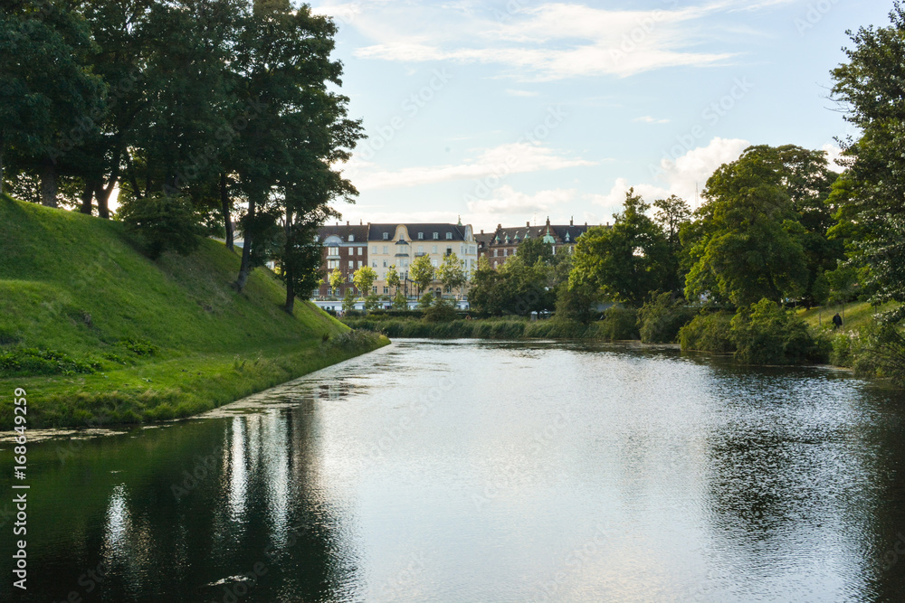 Copenhagen cityscape, Denmark. Old architecture on a canal bank, panoramic view of European city