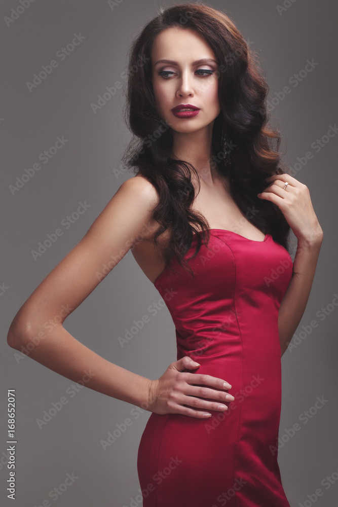 Fototapeta premium girl in a red dress.