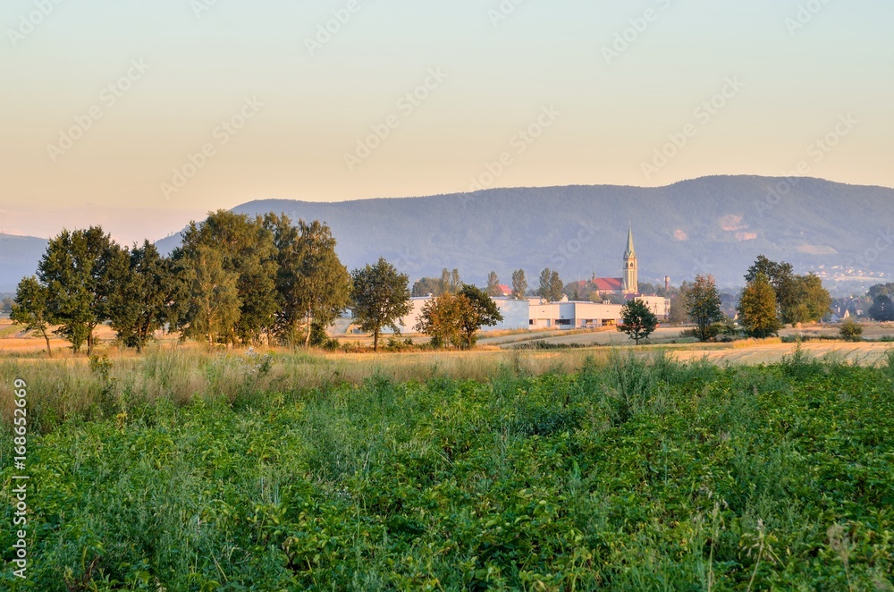 Summer rural landscape. Countryside in Poland against the background of beautiful hills. Summer rural landscape. Countryside in Poland against the background of beautiful hills.