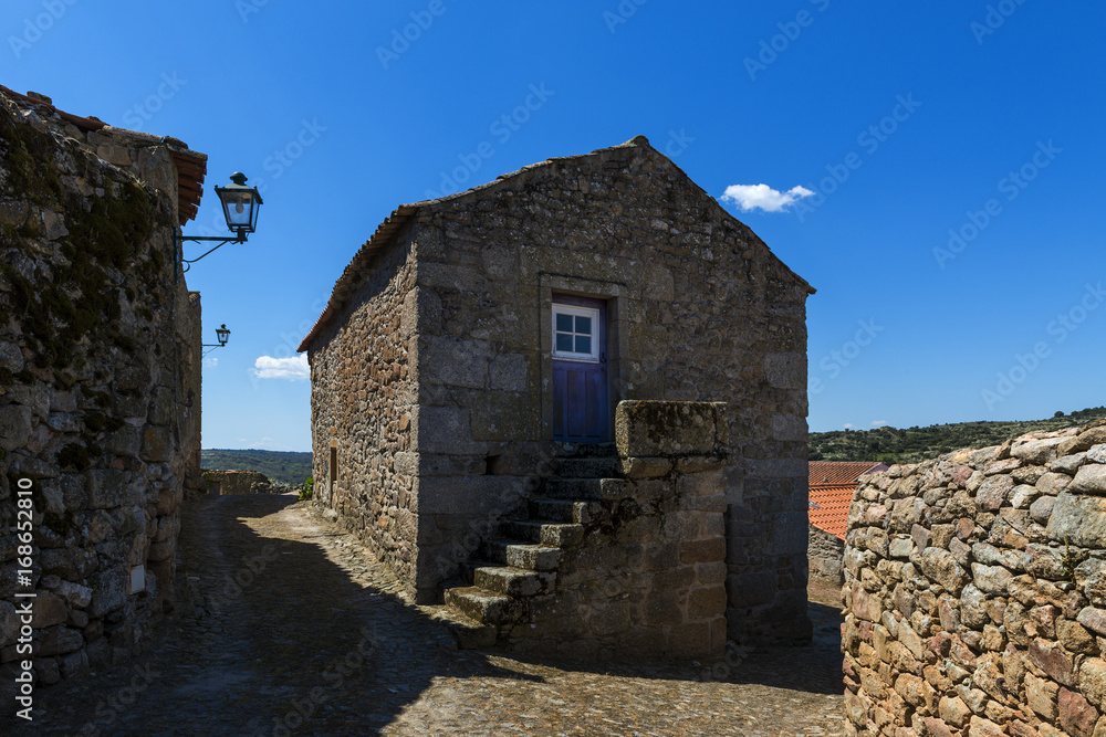 Traditional house made of stone in the historic village of Castelo Mendo, in Portugal; Concept for travel in Portugal
