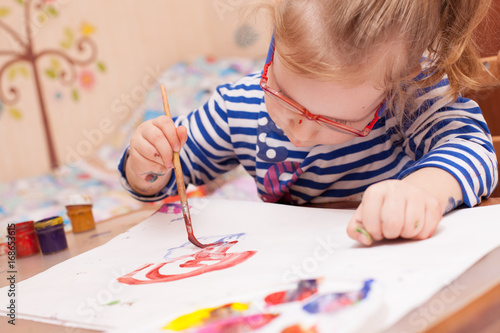 girl sitting at the table