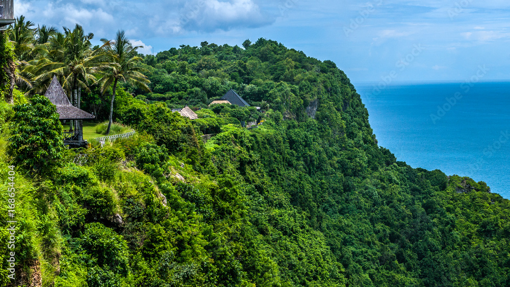 Noble hotel on Cliff edge. Stunning coastline near Nunggalan Beach, Uluwatu Noble hotel on Cliff edge. Stunning coastline near Nunggalan Beach, Uluwatu