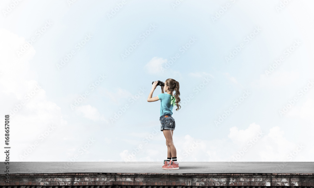 Concept of careless happy childhood with girl of school age look Concept of careless happy childhood with girl of school age look