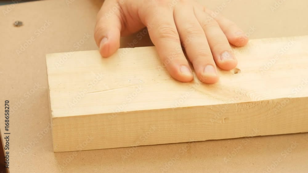 Man hitting nail by hammer Man hitting nail by hammer