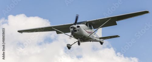small motorplane in the air photo