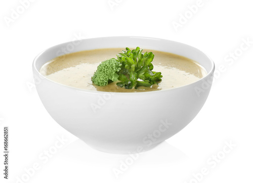 Broccoli cheddar soup in bowl isolated on white