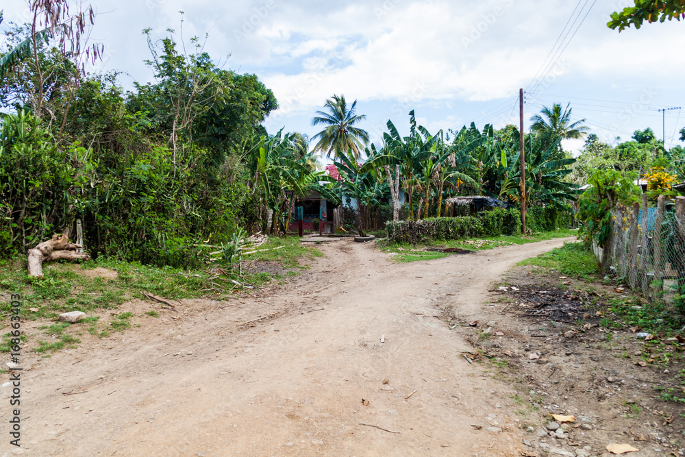 Small trail in El Cobre village, Cuba Small trail in El Cobre village, Cuba