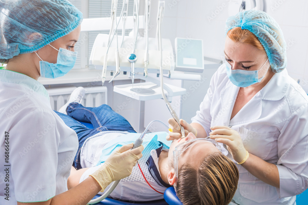 dentist's office process. Cabinet with modern professional equipment. dentist's office process. Cabinet with modern professional equipment.