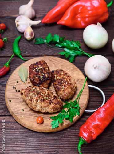 Three meat cutlets with spices