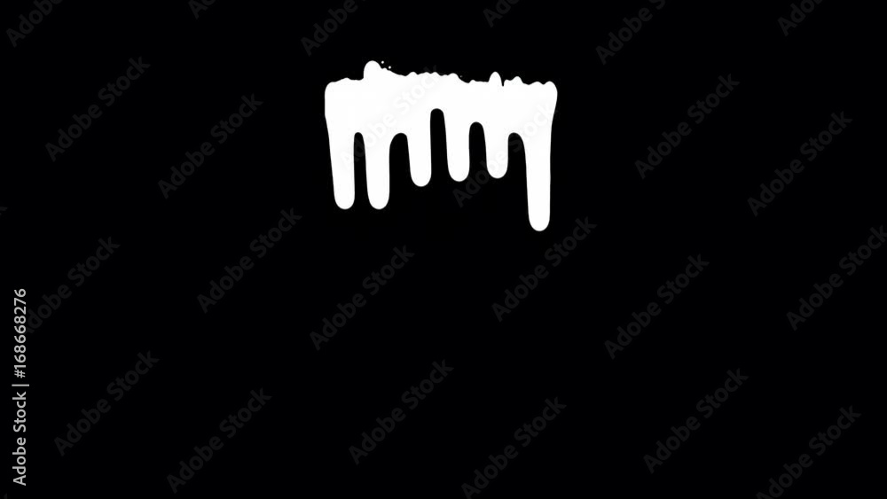 White ink dripping over black screen background. Close-up shot White ink dripping over black screen background. Close-up shot