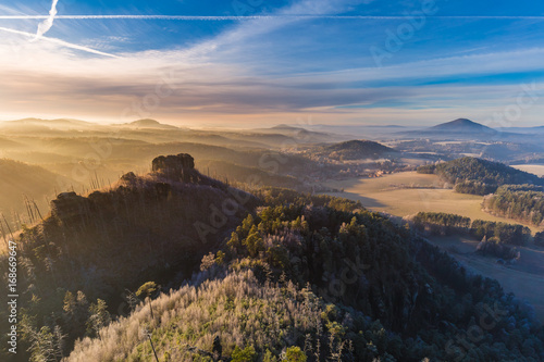 Autumn sunrise over Jetrichovice, beautiful landscape, Bohemian Switzerland, Czech Republic