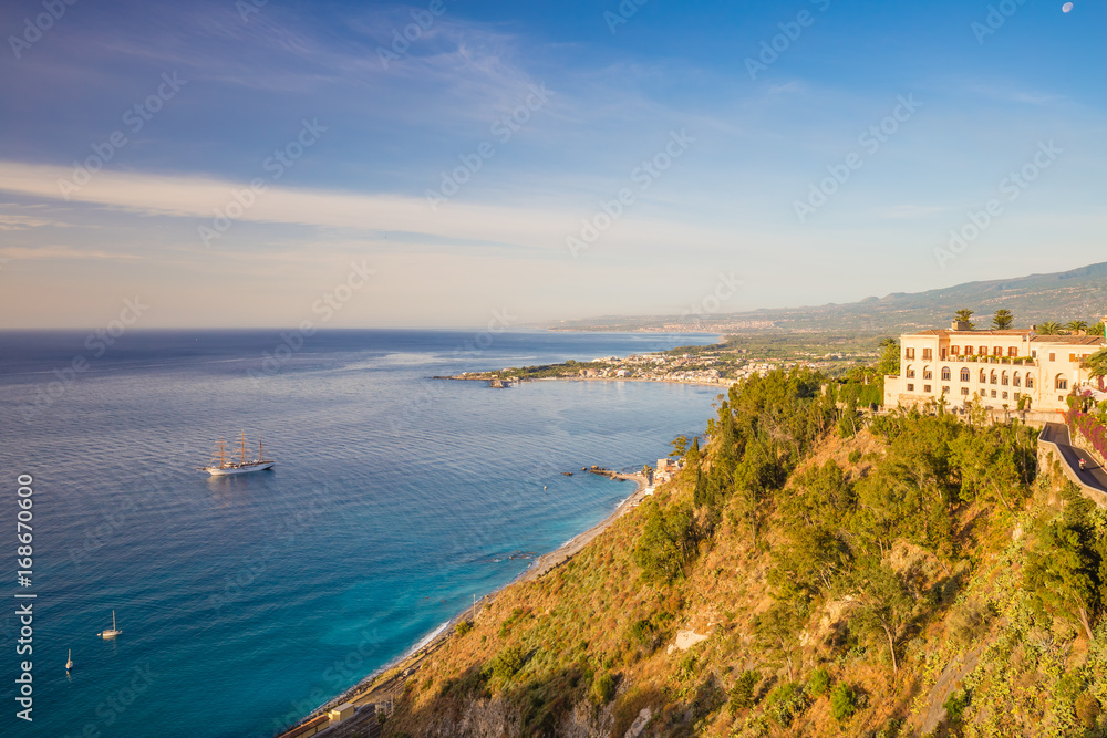 Panoramic sea view from Taormina main square Piazza 9 Aprile, overlooking Giardini Naxos bay, Taormina, Sicily, Italy