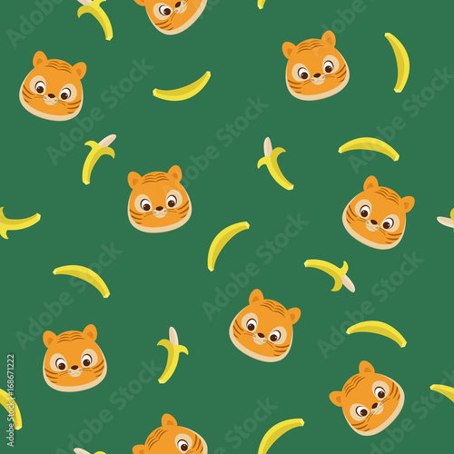 Fototapeta Naklejka Na Ścianę i Meble -  Tiger cub and bananas