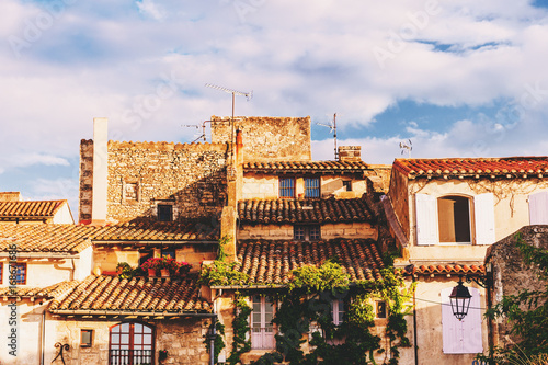 Fototapeta Naklejka Na Ścianę i Meble -  Old buildings in Provence at sunset, image taken in Arles, France