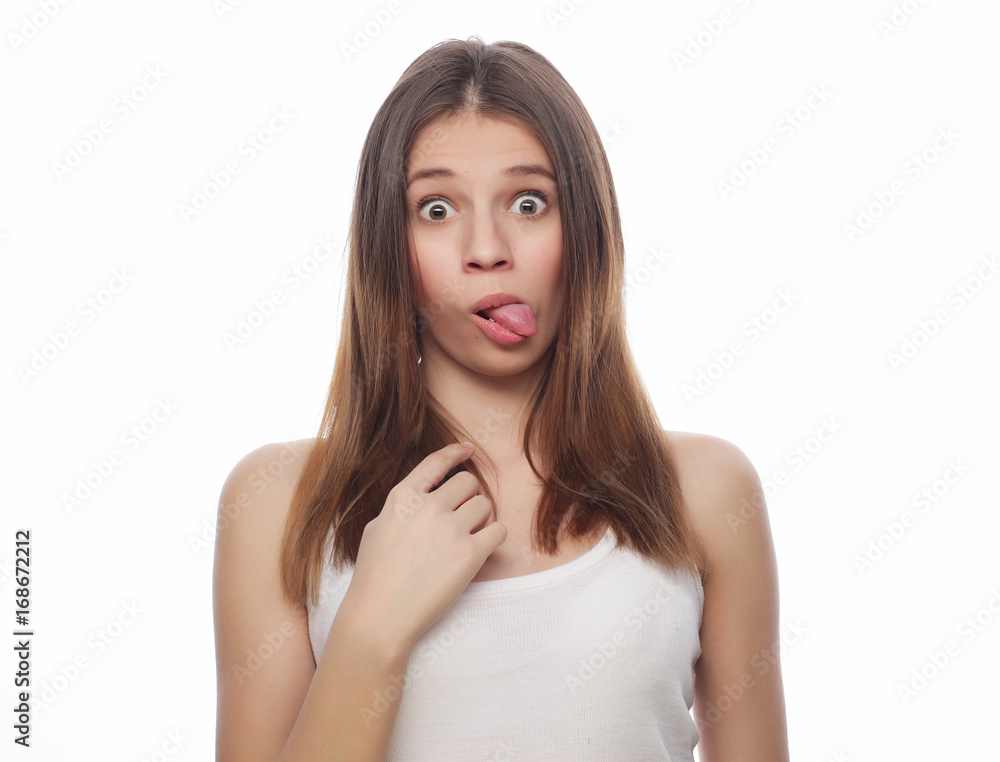 lifestyle and people concept: Beautiful young surprised woman 
