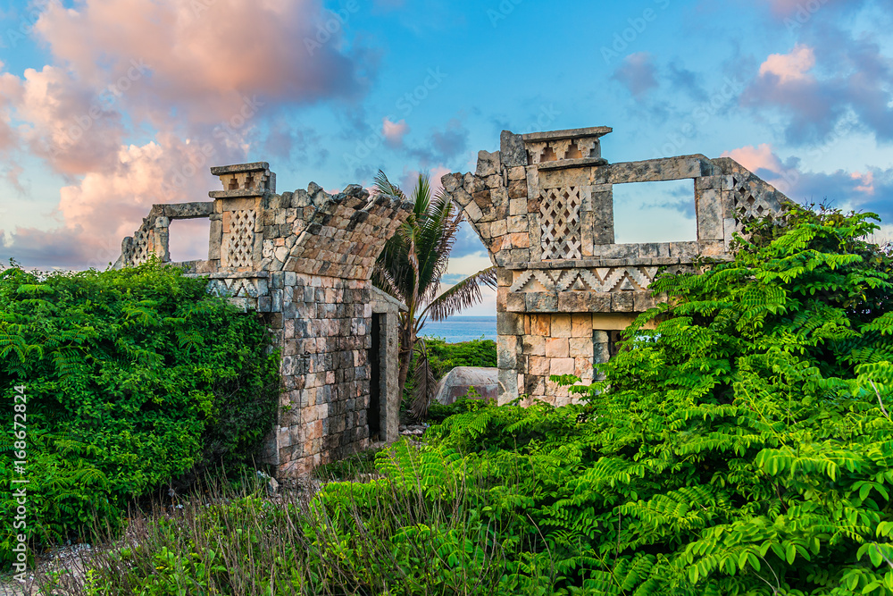 The temple of Ixchel at Beach of Isla Mujeres at sunset. Ixchel Mayan