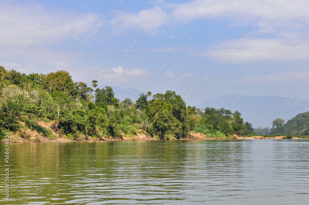 Riverside landscape in the Nam Ou River, Laos Riverside landscape in the Nam Ou River, Laos