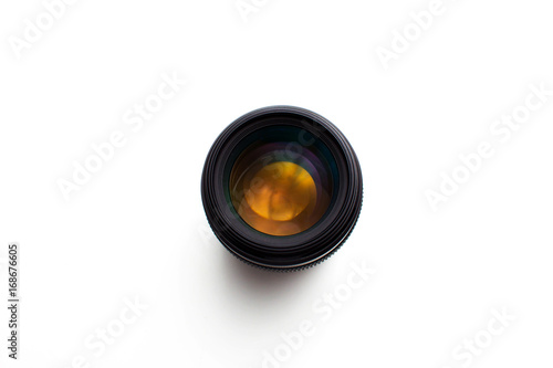 close-up view of a camera lens on a white background