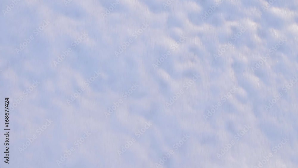 Slow motion shot of beach sand texture with waves coming an going back to the sea or ocean. Top view of soft wave of the sea on the beach. Slow motion shot of beach sand texture with waves coming an going back to the sea or ocean. Top view of soft wave of the sea on the beach.
