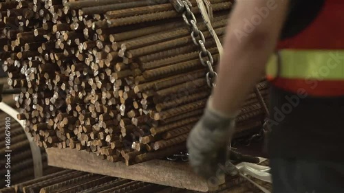 Placing A Bundle Of Steel Bars In Warehouse 