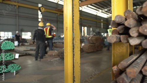 Workers Cutting Bundles Of Steel Bars - Slider - Right to Left 