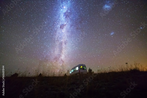 Night sky with milky way over campervan, South island New Zealand
