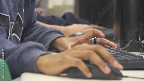 Girl With Silver Ring Typing And Using Mouse On Computer - Close Up 