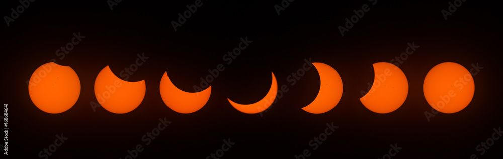 Obraz premium Stages of Partial Solar Eclipse, with a peak magnitude of 80 percent. Observed in Dallas, Texas on August 21, 2017.