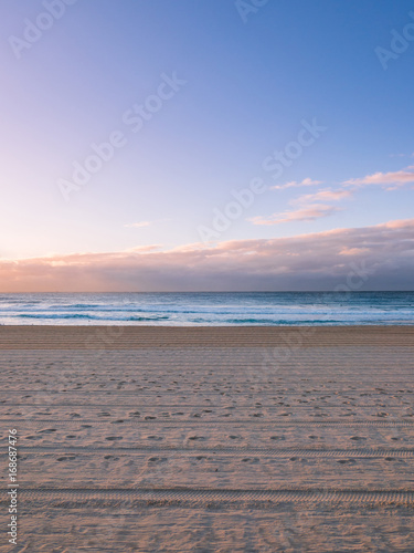 A clean and empty beach in the morning.