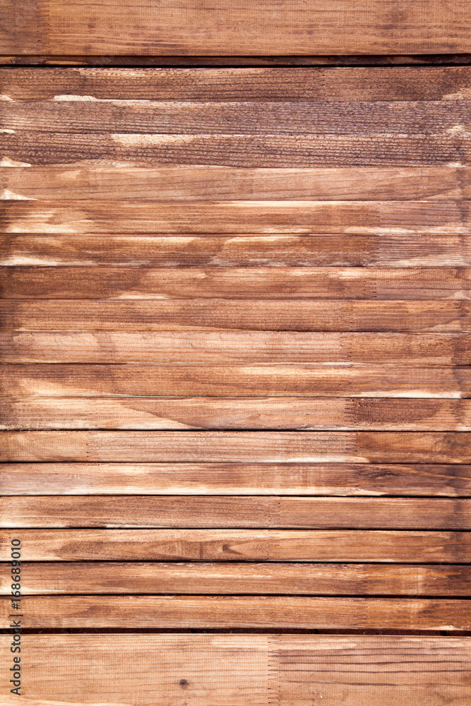 Fototapeta premium Old vintage cracked rustic burned brown wood texture. Background and surface for design ideas. Top view. Natural wooden board. Pine and oak wood table and wall. Shutters, blinds and window jalousie.