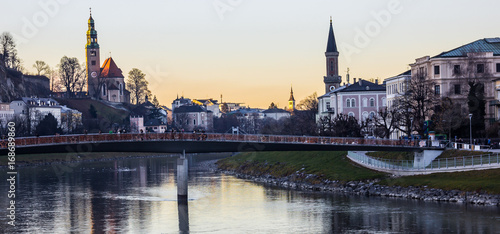 Romantic Twilight view Day Scene of Salzburg Old Town with Makartsteg Bridge and Salzach River as foreground, Salzburg
