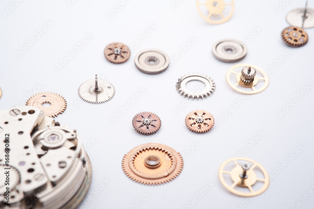 Obraz premium Detail of watch machinery on the table. 