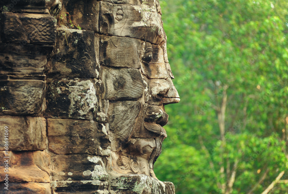 Buddha Face Carved On Stone At Angkor Wat Temple,Cambodia Buddha Face Carved On Stone At Angkor Wat Temple,Cambodia