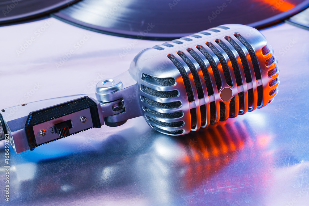 microphone and segment of vinyl record microphone and segment of vinyl record