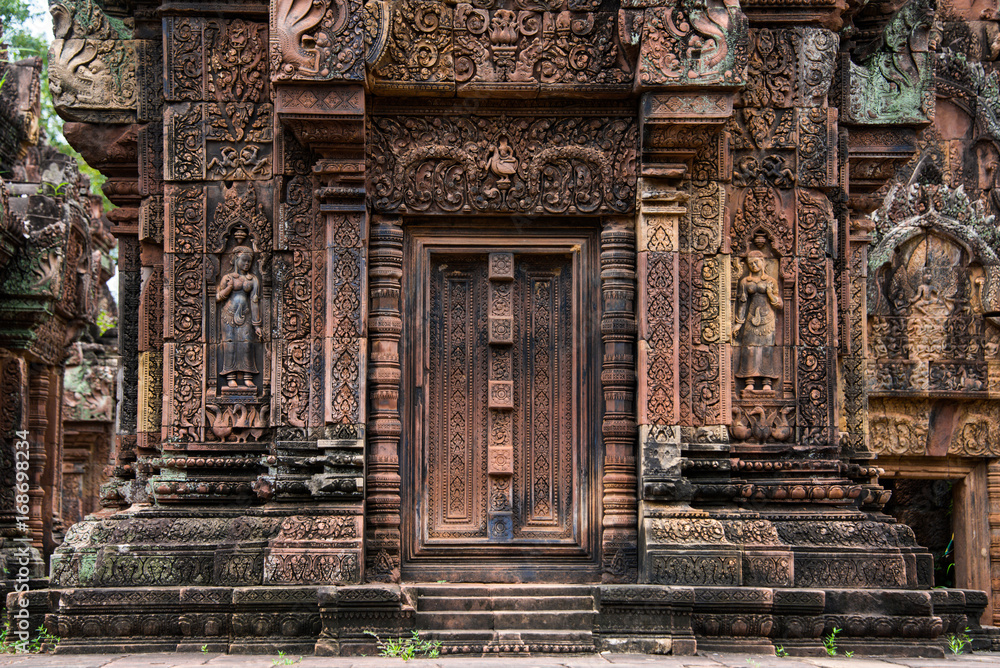 Banteay Srei is built largely of red sandstone and is a 10th-century Cambodian temple dedicated to the Hindu god Shiva, Siem Reap, Cambodia