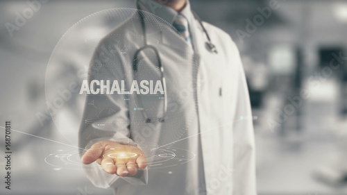 Doctor holding in hand Achalasia photo